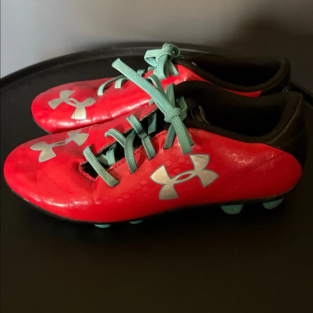 Under Armour size 1 Red and Teal Soccer Cleats